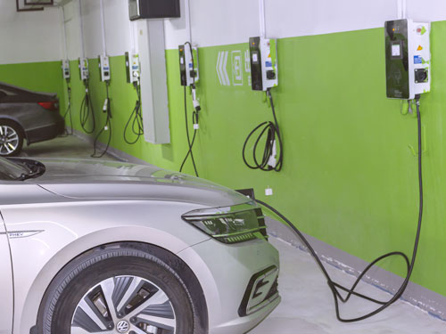 AC low-power wall-mounted electric vehicle charger